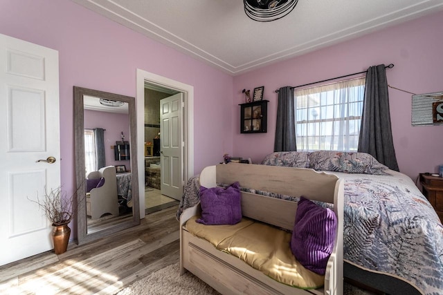 bedroom featuring wood-type flooring