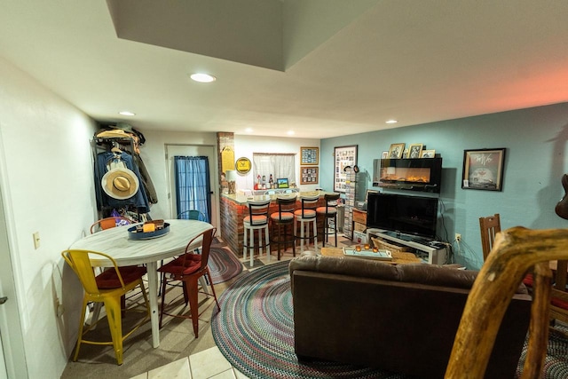 tiled living room with bar area