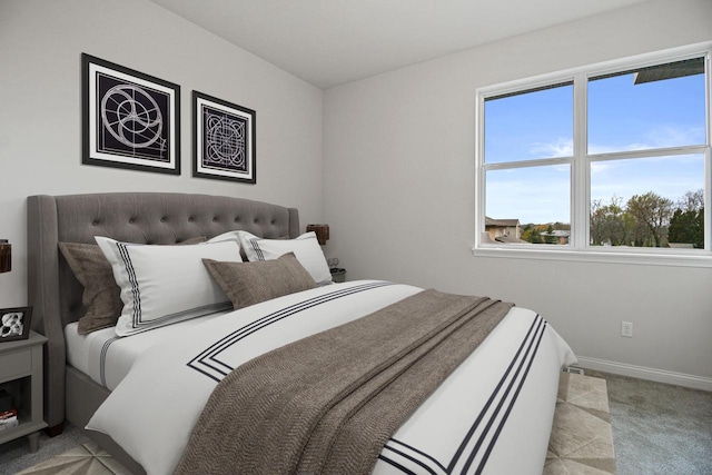 bedroom with light colored carpet