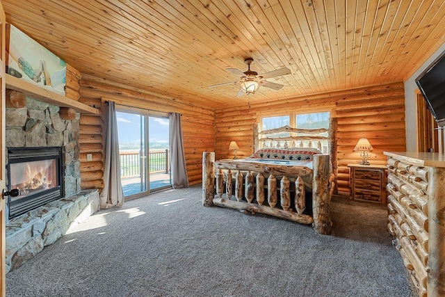 E7498 Mill Rd, Spring Green, WI 53588 - bedroom with access to outside, wood ceiling, carpet flooring, a stone fireplace, and rustic walls