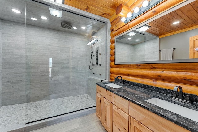 E7498 Mill Rd, Spring Green, WI 53588 - full bath with double vanity, a walk in shower, and recessed lighting