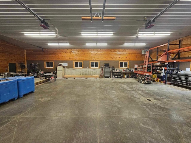 E7498 Mill Rd, Spring Green, WI 53588 - garage featuring a garage door opener and a workshop area