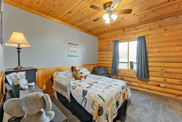 E7498 Mill Rd, Spring Green, WI 53588 - carpeted bedroom with rustic walls, wainscoting, wood ceiling, and ornamental molding