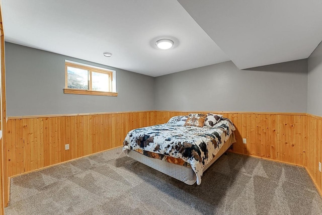 E7498 Mill Rd, Spring Green, WI 53588 - carpeted bedroom with wainscoting and wood walls