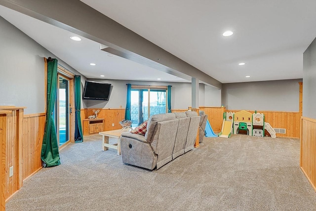 E7498 Mill Rd, Spring Green, WI 53588 - carpeted living room featuring wainscoting, wooden walls, and recessed lighting