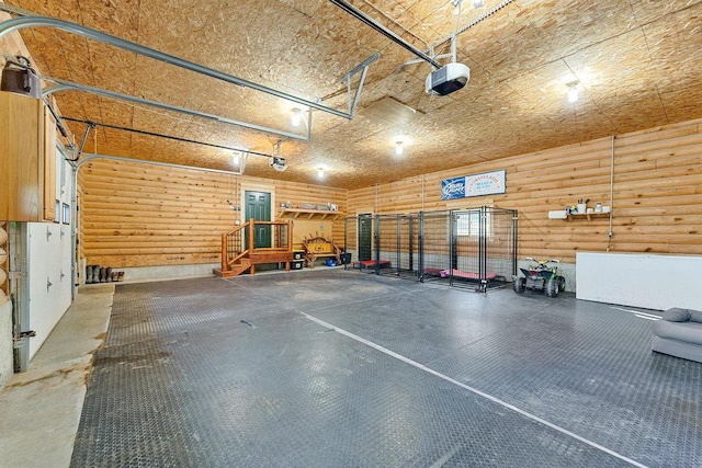 E7498 Mill Rd, Spring Green, WI 53588 - garage featuring a garage door opener