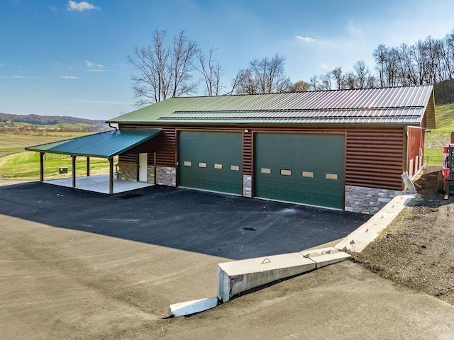 E7498 Mill Rd, Spring Green, WI 53588 - garage featuring a detached garage
