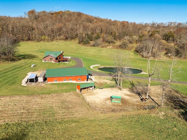 E7498 Mill Rd, Spring Green, WI 53588 - surrounding community with an outdoor structure, a pole building, and a yard
