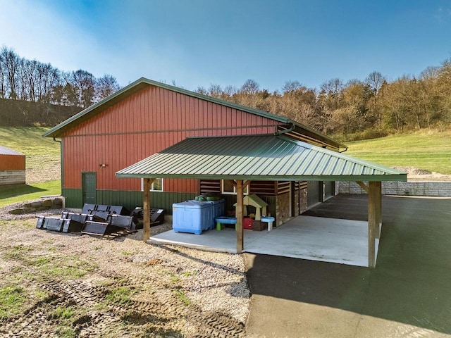 E7498 Mill Rd, Spring Green, WI 53588 - view of vehicle parking with a carport and driveway