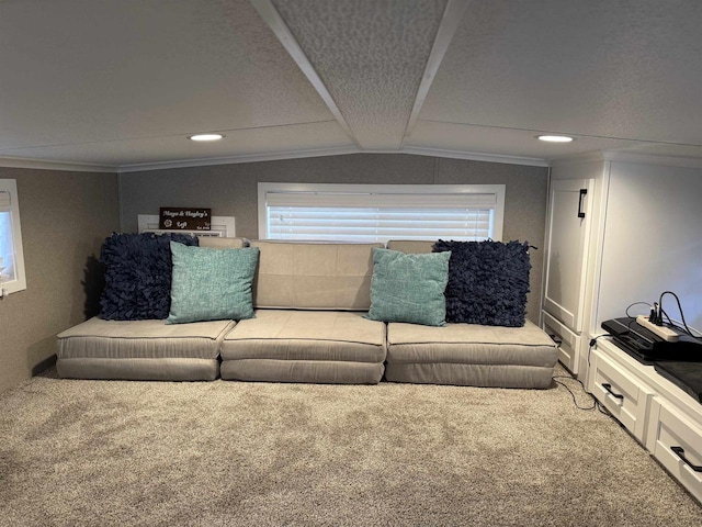 living room with carpet, vaulted ceiling, and crown molding