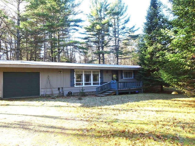 9675 Wayne Dr, Woodruff, WI 54568 - single story home featuring a garage