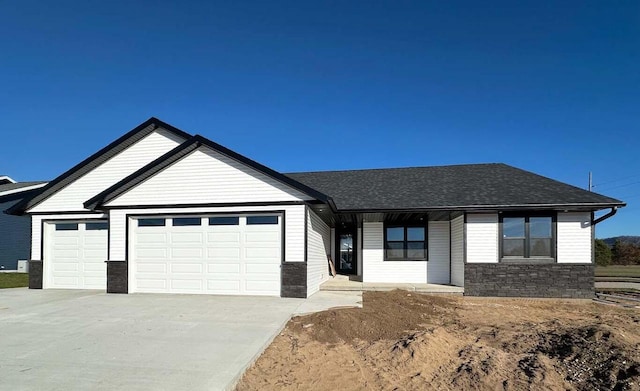 single story home featuring a garage