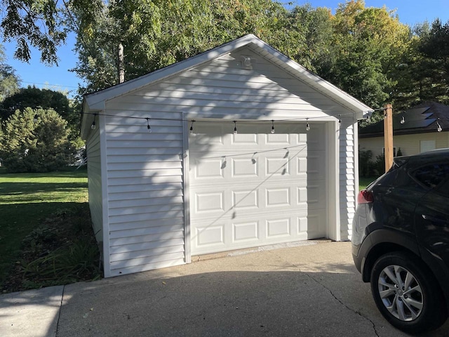 garage with a lawn