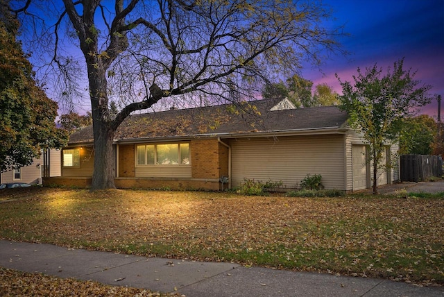 ranch-style home with a garage