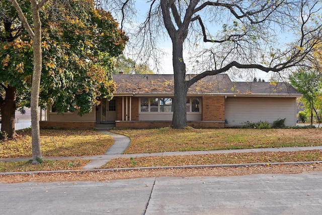 view of front of home with a front lawn