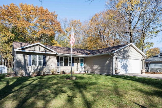 ranch-style home featuring a garage and a front yard