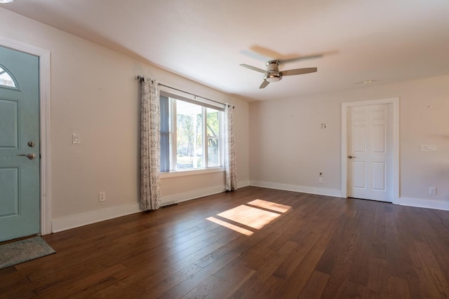 foyer entrance featuring dark hardwood / wood-style flooring and ceiling fan