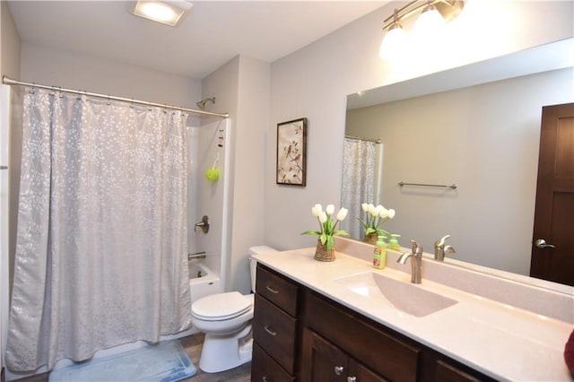 full bathroom with toilet, vanity, and shower / bath combination with curtain