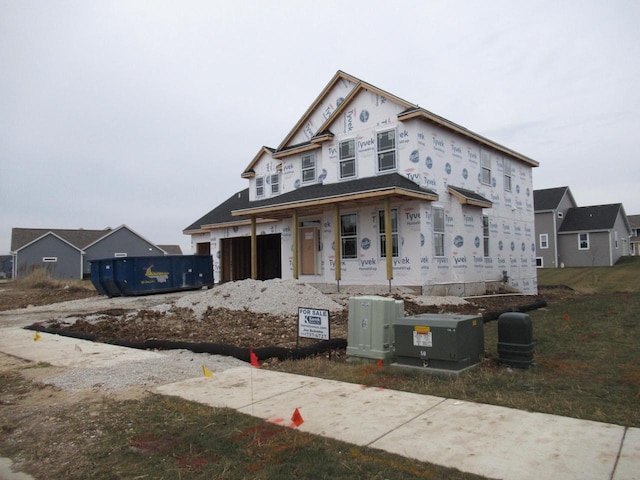 1581 Creekview Ln, Oconomowoc, WI 53066 - property under construction with covered porch