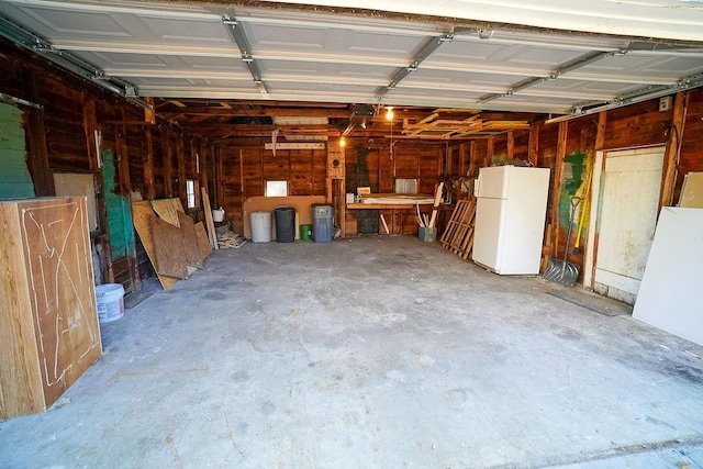 garage with white refrigerator