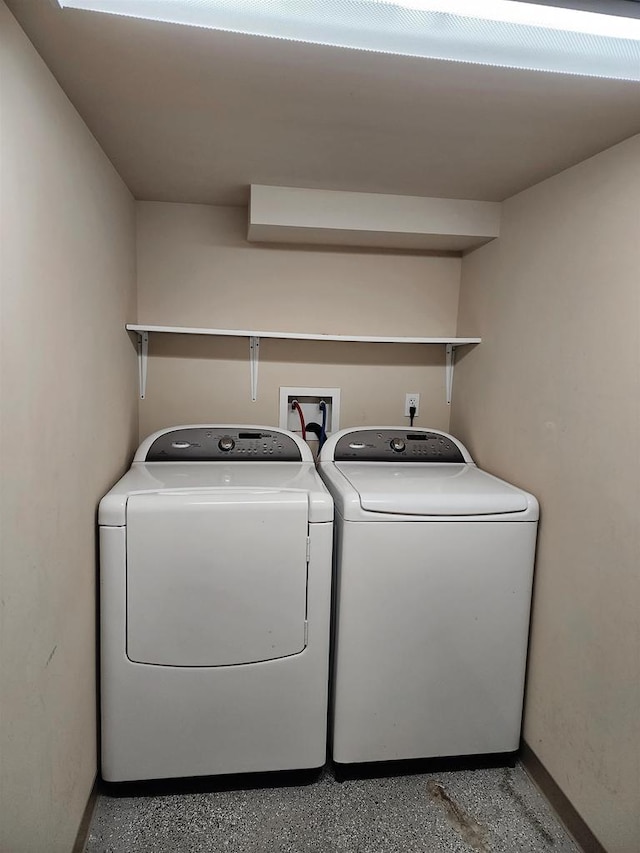 laundry room featuring separate washer and dryer