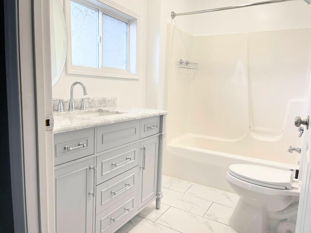 full bathroom featuring toilet, vanity, and bathing tub / shower combination