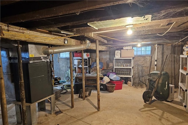 basement featuring heating unit