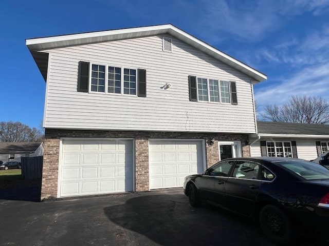 exterior space with a garage