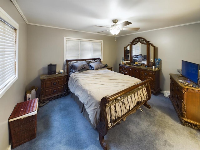 carpeted bedroom featuring ornamental molding and ceiling fan