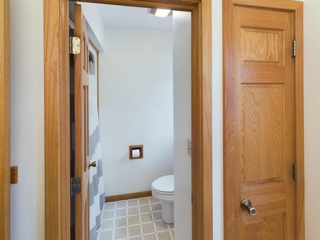 bathroom featuring toilet