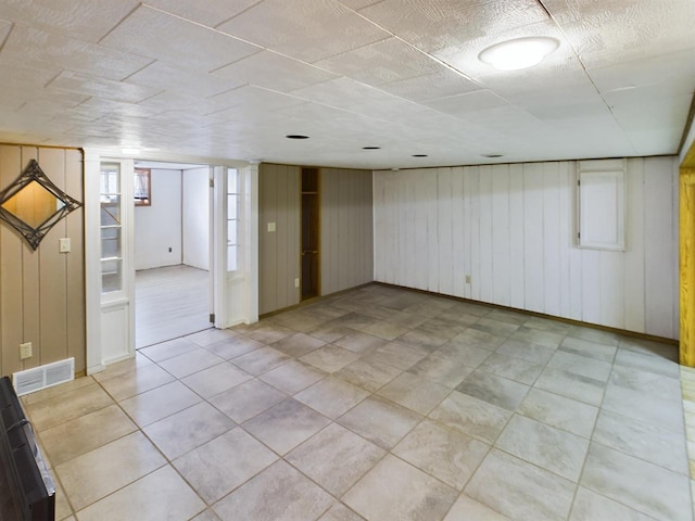 basement with wood walls