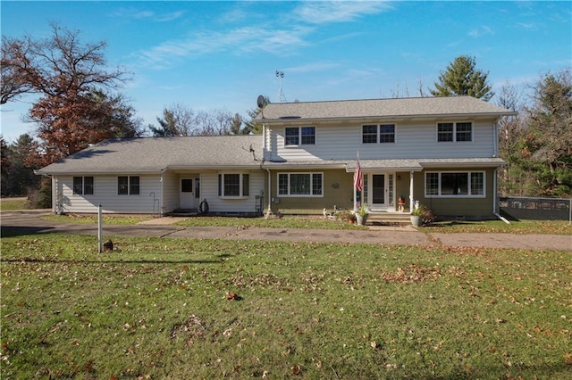 view of front of home with a front lawn