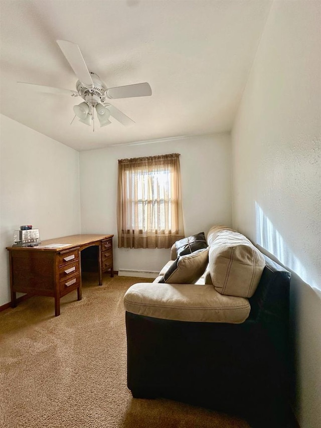 bedroom featuring ceiling fan and carpet