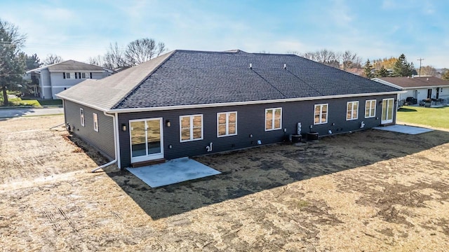 back of property featuring central air condition unit and a patio area