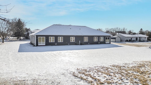 view of snow covered house