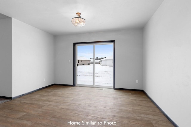 empty room featuring light hardwood / wood-style flooring