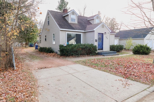 view of new england style home