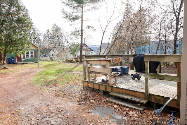 wooden deck with grilling area