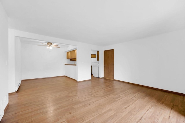 unfurnished living room with ceiling fan, light hardwood / wood-style flooring, and a baseboard heating unit