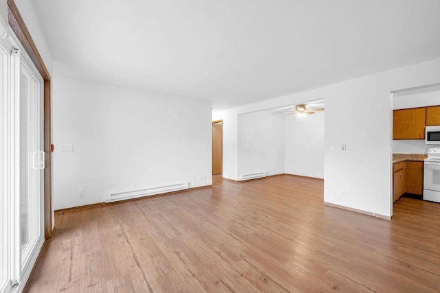 unfurnished living room featuring ceiling fan, baseboard heating, and light wood-type flooring