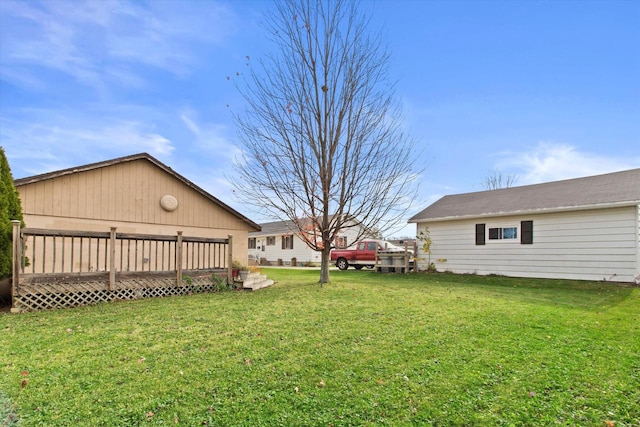 view of yard with a deck