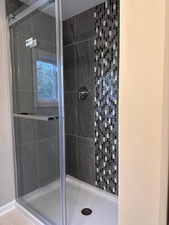 bathroom featuring walk in shower