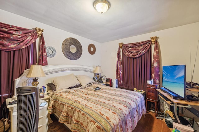 bedroom featuring wood-type flooring