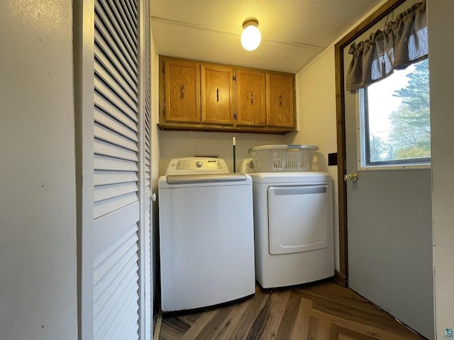 219 N 8th Ave W, Washburn, WI 54891 - washroom featuring cabinet space and separate washer and dryer