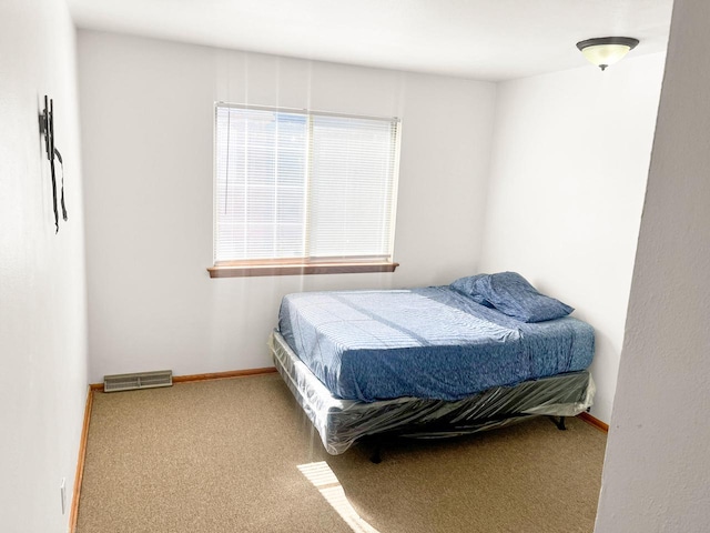 bedroom featuring carpet flooring