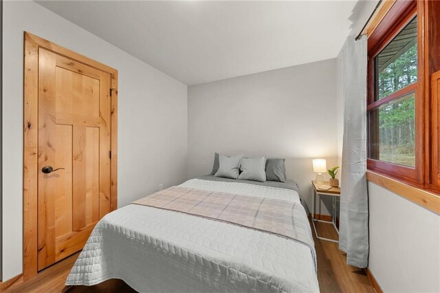 bedroom featuring hardwood / wood-style flooring