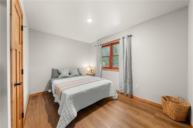 bedroom featuring light hardwood / wood-style floors