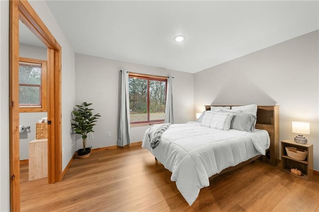 bedroom featuring light wood-type flooring