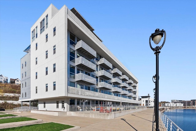 view of building exterior featuring a water view