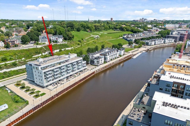 birds eye view of property featuring a water view